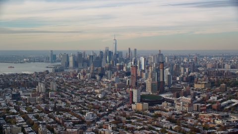 AX120_084.0000126F - Aerial stock photo of Downtown Brooklyn and the Lower Manhattan skyline in Autumn, New York City