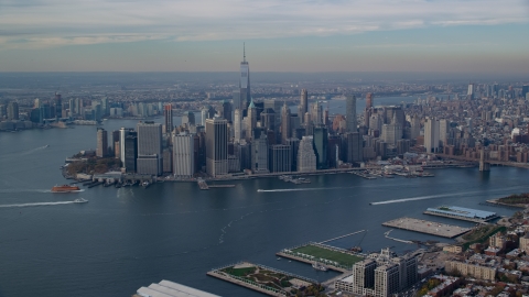 Lower Manhattan across the East River in Autumn, New York City Aerial Stock Photos | AX120_090.0000099F