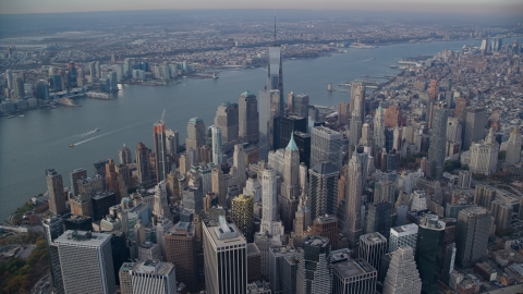 AX120_095.0000000F - Aerial stock photo of Lower Manhattan skyscrapers and the Hudson River in New York City