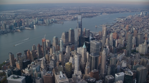 AX120_095.0000177F - Aerial stock photo of Skyscrapers in Lower Manhattan by the Hudson River, New York City