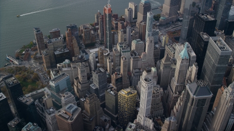 AX120_097.0000283F - Aerial stock photo of A view of Lower Manhattan skyscrapers and high-rise buildings in Autumn, New York City