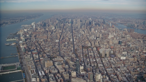 AX120_111.0000076F - Aerial stock photo of Skyscrapers in Midtown Manhattan, New York City