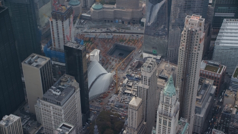 AX120_115.0000095F - Aerial stock photo of Part of the World Trade Center Memorial in Lower Manhattan, New York City