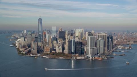 AX120_121.0000290F - Aerial stock photo of Battery Park and Lower Manhattan in Autumn, New York City