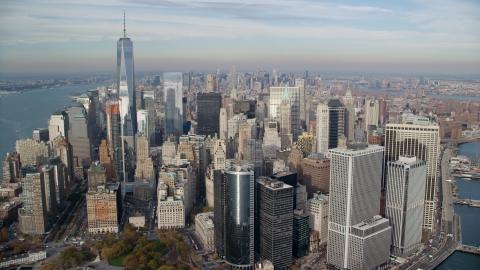 AX120_124.0000165F - Aerial stock photo of Lower Manhattan skyscrapers in Autumn, New York City