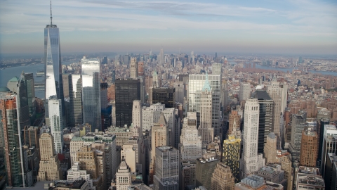 AX120_125.0000225F - Aerial stock photo of Freedom Tower and Lower Manhattan skyscrapers, New York City