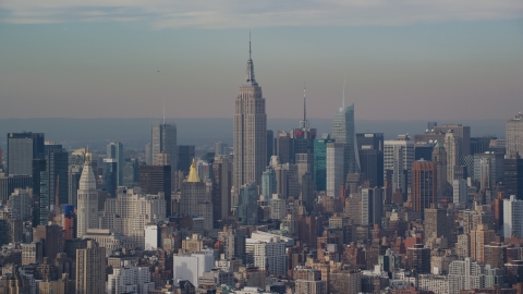 AX120_139.0000076F - Aerial stock photo of The Empire State Building in Midtown Manhattan, New York City