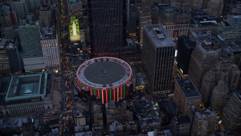 The Madison Square Garden arena at sunset in Midtown, New York City Aerial Stock Photos | AX121_085.0000087F