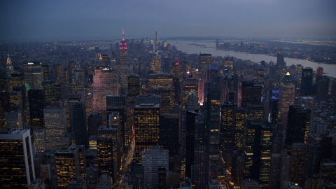 Midtown skyscrapers near Times Square at sunset in New York City Aerial Stock Photos | AX121_102.0000049F