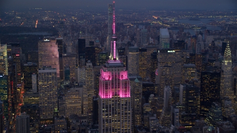 The top half of Empire State Building at sunset in Midtown, New York City Aerial Stock Photos | AX121_110.0000032F