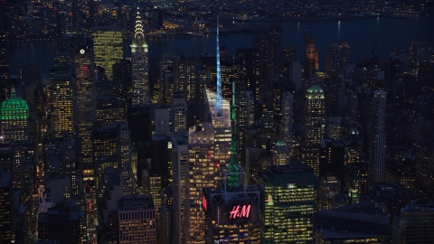 Bank of America Tower spire in Midtown at night in New York City Aerial Stock Photos | AX121_132.0000192F