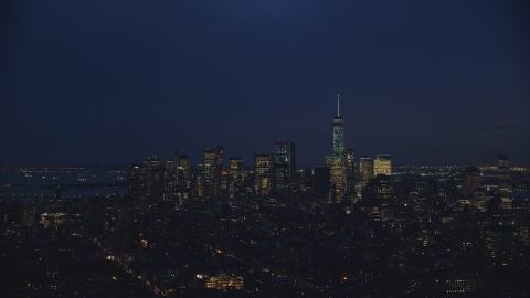 The Lower Manhattan skyline at night in New York City Aerial Stock Photos | AX121_153.0000127F