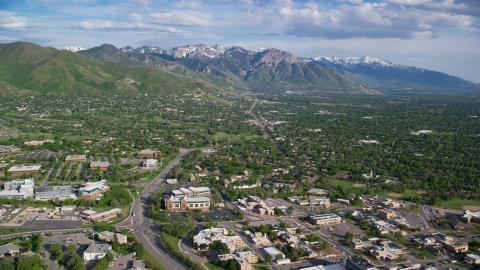 AX129_079.0000000F - Aerial stock photo of Salt Lake City Suburbs, Wasatch Range, Salt Lake City, Utah