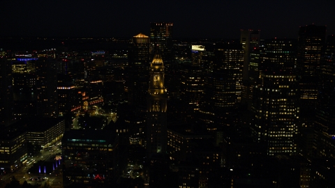 AX141_077.0000075 - Aerial stock photo of Custom House Tower skyscraper in Downtown Boston, Massachusetts, night