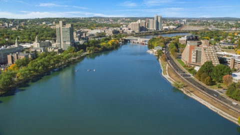 AX142_057.0000212 - Aerial stock photo of Charles River by office buildings, Boston, Massachusetts