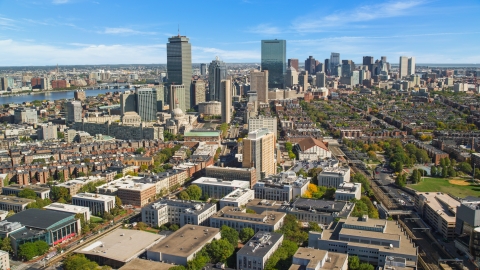 AX142_147.0000071 - Aerial stock photo of City buildings and tall skyscrapers in Downtown Boston, Massachusetts