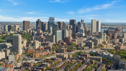 AX142_149.0000336 - Aerial stock photo of City buildings and towering skyscrapers in Downtown Boston, Massachusetts