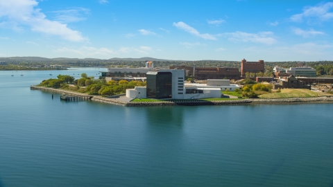 AX142_216.0000278 - Aerial stock photo of The John F. Kennedy Presidential Library in Boston, Massachusetts