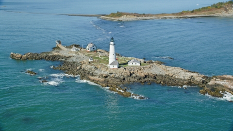 AX142_258.0000167 - Aerial stock photo of The Boston Light on Little Brewster Island, Boston Harbor, Massachusetts