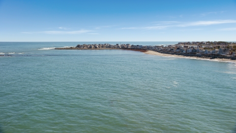 AX143_037.0000000 - Aerial stock photo of Beach homes overlooking the ocean in Scituate, Massachusetts