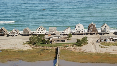 Several elevated oceanfront homes in Humarock, Massachusetts Aerial Stock Photos | AX143_049.0000327