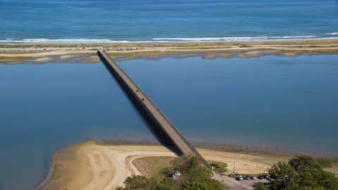 AX143_077.0000117 - Aerial stock photo of Two cars on the Powder Point Bridge in Duxbury, Massachusetts