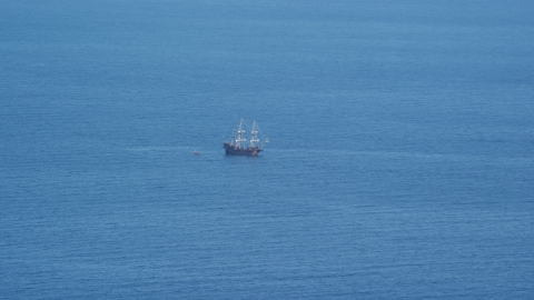 AX143_129.0000180 - Aerial stock photo of A historic sailing ship on Cape Cod Bay, Massachusetts