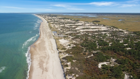 A beach and nearby sand dunes, Barnstable, Massachusetts Aerial Stock Photos | AX143_132.0000000