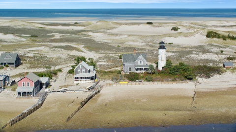 Sandy Neck Colony houses by Sandy Neck Light on Cape Cod, Barnstable, Massachusetts Aerial Stock Photos | AX143_144.0000125