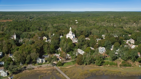 AX143_197.0000247 - Aerial stock photo of A small coastal community and First Congregational Church, Wellfleet, Massachusetts