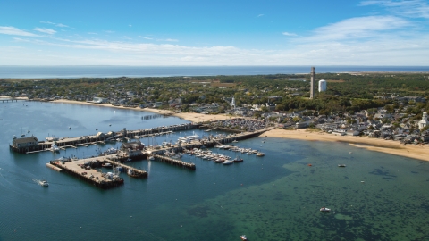 A small coastal town seen from near piers in the bay, Provincetown, Massachusetts Aerial Stock Photos | AX143_231.0000282