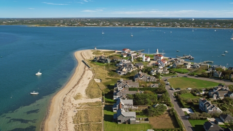 AX144_088.0000000 - Aerial stock photo of Oceanfront homes and Nantucket Harbor Lights, Nantucket, Massachusetts