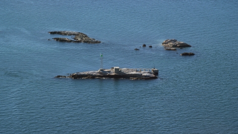 AX144_183.0000000 - Aerial stock photo of A view of Dumpling Rocks Light on Dumpling Rocks, Massachusetts