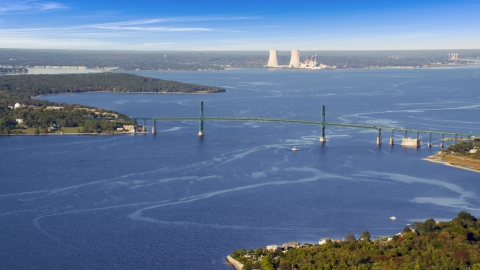 AX145_009.0000059 - Aerial stock photo of Mount Hope Bridge and the Dynegy Brayton Point, Portsmouth, Rhode Island