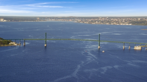 AX145_010.0000220 - Aerial stock photo of Mount Hope Bridge and Mount Hope Bay, Portsmouth, Rhode Island