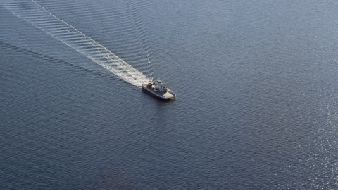 A car ferry cruising across the water in Portsmouth, Rhode Island Aerial Stock Photos | AX145_011.0000279