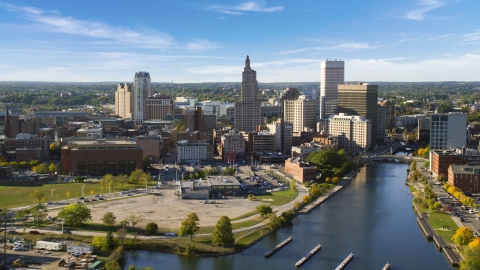 AX145_035.0000034 - Aerial stock photo of Skyscrapers beside the Providence River in Downtown Providence, Rhode Island