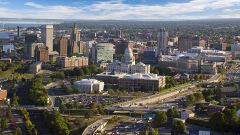 AX145_054.0000255 - Aerial stock photo of The Rhode Island State House near tall skyscrapers in Downtown Providence, Rhode Island