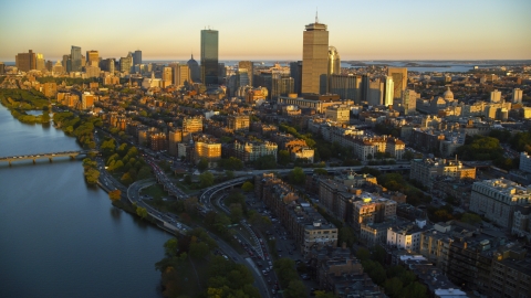 AX146_060.0000009F - Aerial stock photo of Back Bay and city skyscrapers, Downtown Boston, Massachusetts, sunset