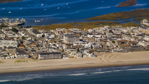 AX147_155.0000000 - Aerial stock photo of A coastal town beside an empty beach, Hampton, New Hampshire