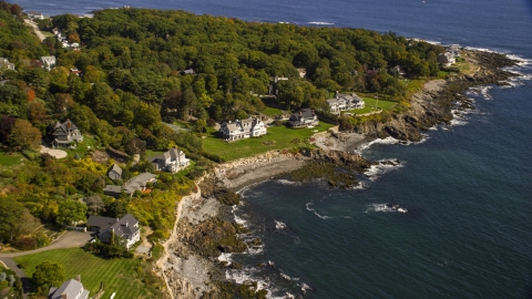 AX147_233.0000213 - Aerial stock photo of Upscale oceanfront homes in autumn, York, Maine