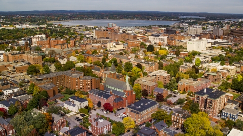 AX147_326.0000187 - Aerial stock photo of A view of apartments near Saint Dominics Roman Catholic Church, autumn, Portland, Maine