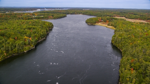 The Kennebec River, shores lined with colorful trees, Phippsburg, Maine Aerial Stock Photos | AX147_408.0000000