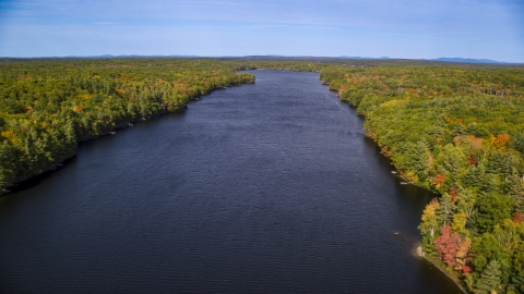 AX148_022.0000212 - Aerial stock photo of A colorful forest around Biscay Pond in autumn, Damariscotta, Maine