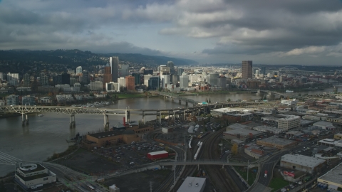 AX153_053.0000346F - Aerial stock photo of Willamette River and bridges with a view of Downtown Portland in autumn, Oregon