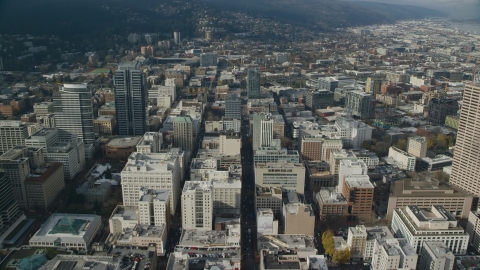 AX153_094.0000024F - Aerial stock photo of Office buildings on Washington Street in Downtown Portland, Oregon