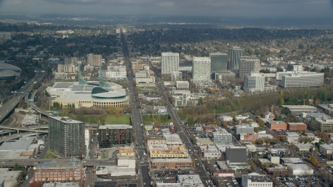 AX153_100.0000327F - Aerial stock photo of Oregon Convention Center beside office buildings in Lloyd District, Portland, Oregon