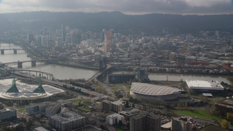 Skyscrapers in Downtown Portland, the Willamette River, and Moda Center in Oregon Aerial Stock Photos | AX153_113.0000000F