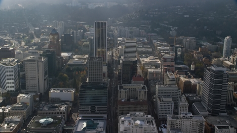 AX153_116.0000267F - Aerial stock photo of SW 5th Avenue through Downtown Portland, Oregon