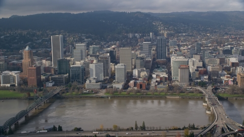 AX153_121.0000032F - Aerial stock photo of Skyscrapers between the Hawthorne and Morrison Bridges, Downtown Portland, Oregon